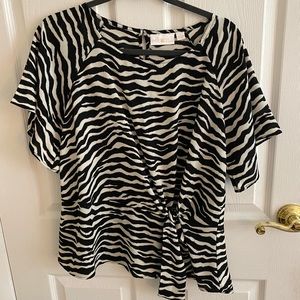 Belle by Kim Gravel (QVC).  Zebra stripe blouse with tie @ side.